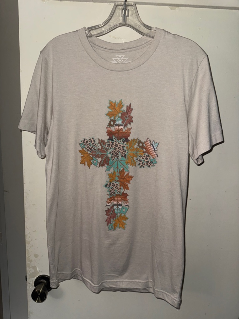 Crazy Train Cream Tee with Teal, Orange, and Brown Leaf Cross